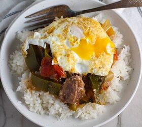 beef stew stove top picadinho with beef cubes, Fried egg on top of cooked Brazilian Beef Stew Stove Top recipe over rice in bowl with fork in it on counter It s a savory succulent and hearty dish that you can make anytime