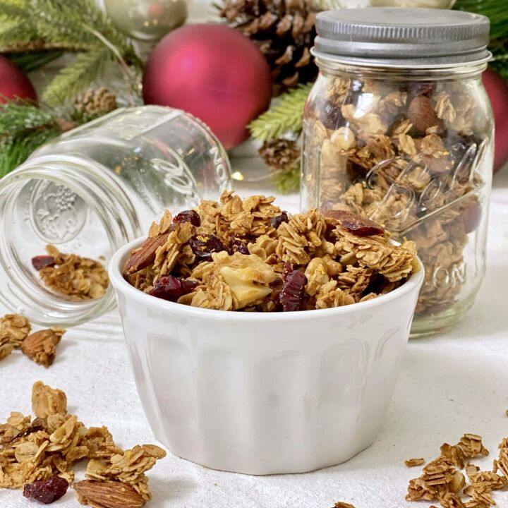 merry christmas granola, Merry Christmas Granola In a white dish with mason jars filled with granola in the background