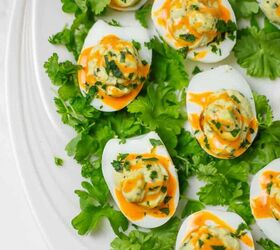 Deviled Avocado Eggs (with Spicy Sauce)