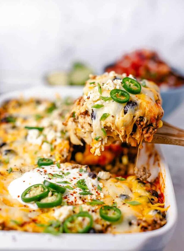 beef enchilada casserole, Beef Enchilada Casserole close up on a wooden spoon