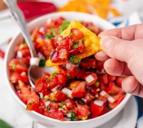 healthy white bean chicken chili, pico de gallo mexican tomato salsa in a bowl with tortilla chips
