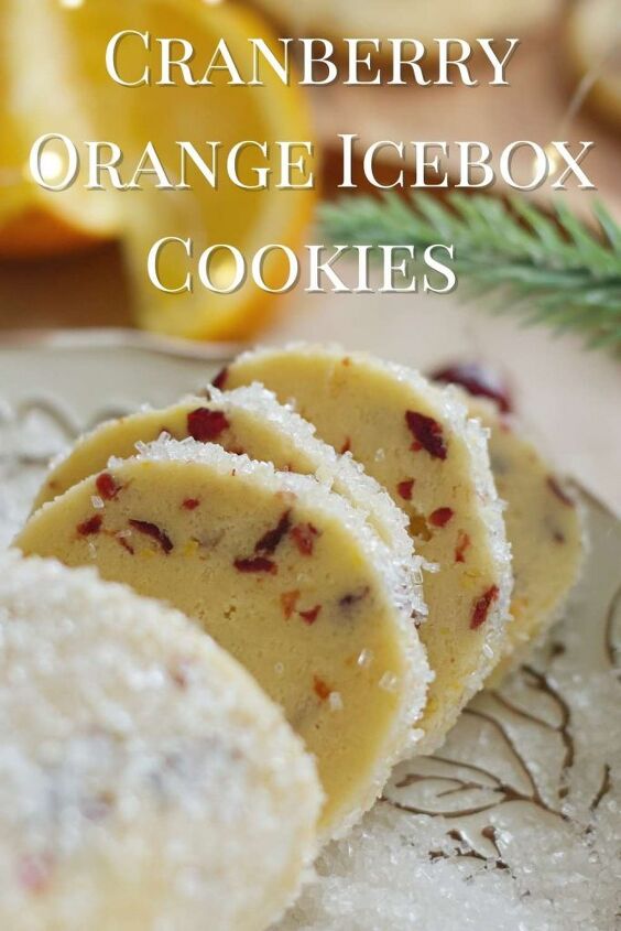 cranberry orange icebox cookies with orange zest drizzle, cookie log sliced up in decorating sugar with script over the top stating Cranberry Orange Icebox Cookies