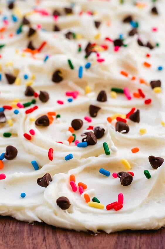 dessert butter board, Close up of buttercream frosting on board with chocolate chips and rainbow sprinkles
