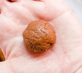 biscoff cookie truffles, Hand holding a rolled truffle