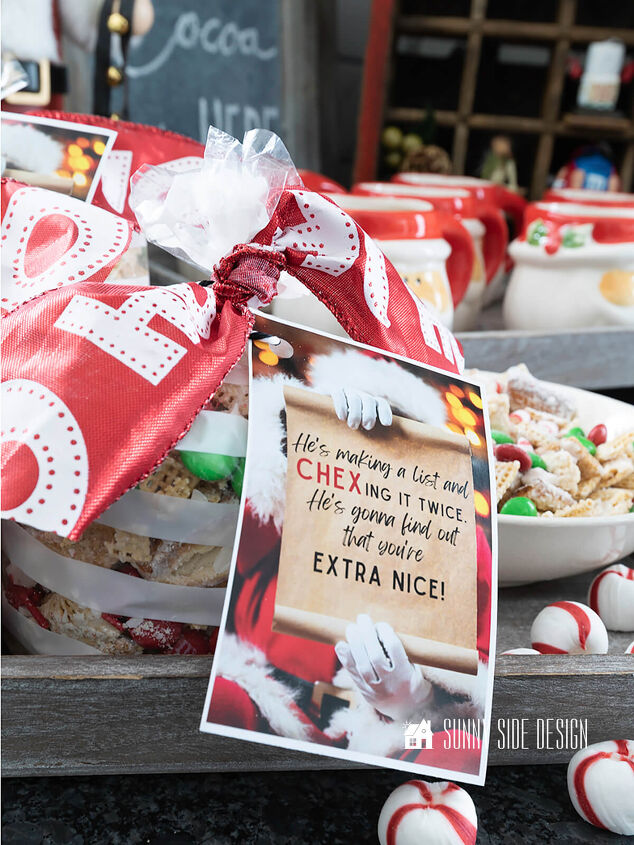 Festive Gift Idea for Neighbors Peppermint Christmas Chex Mix in clear cellophane bags tied with a red and white HO HO ribbon and a free printable gift tag More Peppermint Christmas Chex Mix in a bowl on a grey tray with additional peppermint candies