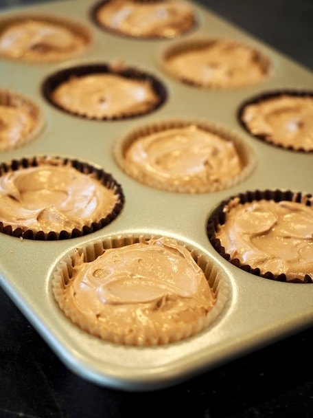 Mini Chocolate French Silk Pies ready to refrigerate in muffin tin