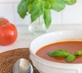 healthy homemade tomato soup very low fat, Healthy Homemade Tomato Soup in white bowl with fresh tomatoes and basil in the background