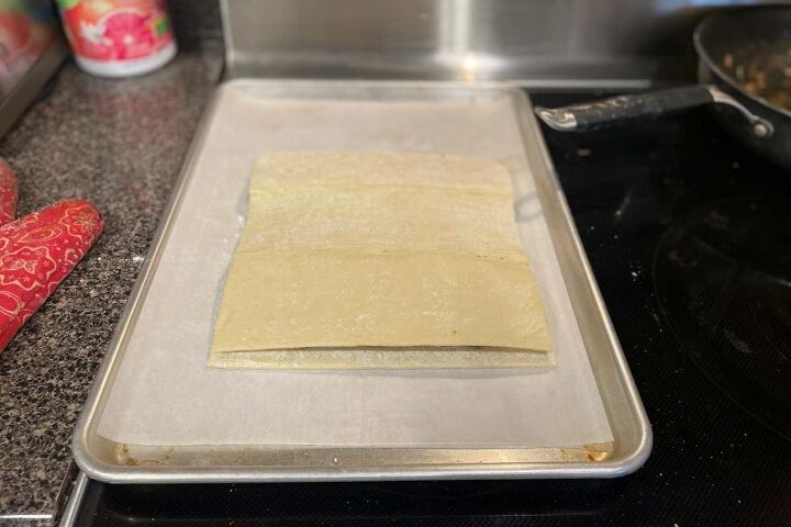 simple ground beef puff pastry recipe, Piece of puff pastry sheet laid on top of the other sheet of puff pasty and beef and gravy mix for Simple Ground Beef Puff Pastry