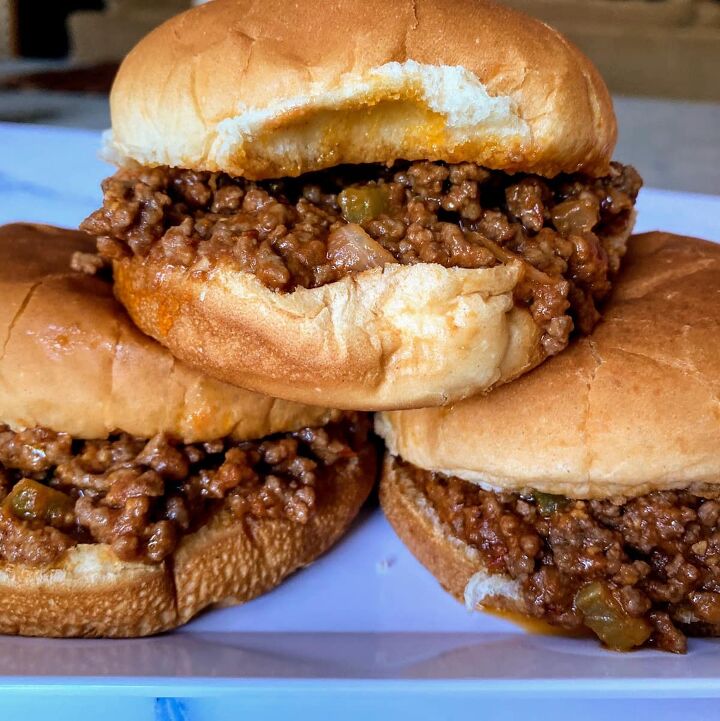old fashioned sloppy joes recipe, three old fashioned sloppy joes with meat spilling out