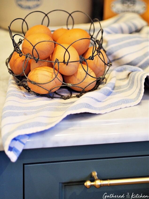how to make homemade eggnog recipe, brown eggs in an antique wire basket sitting on marble counter Gathered In The Kitchen