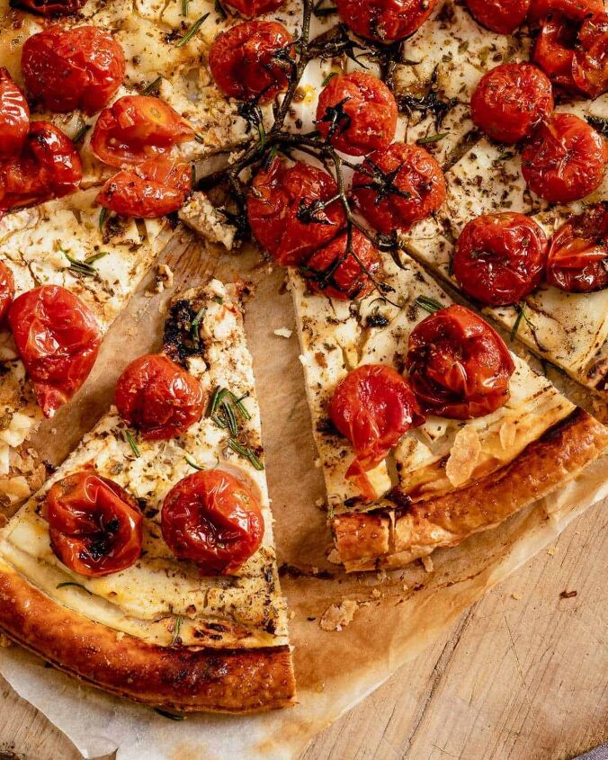 roasted cherry tomatoes tart with cheese, Close up from above of sliced cherry tomatoes tart