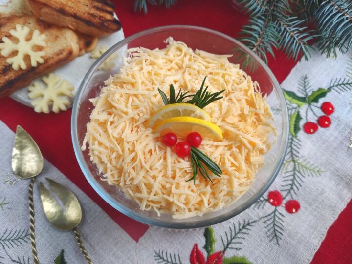 russian cheese salad recipe, a bowl of cheese salad on a holiday table