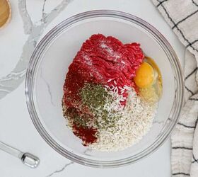 Meatball ingredients measured into a small glass bowl