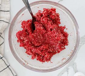 Meatball mixture in a glass bowl