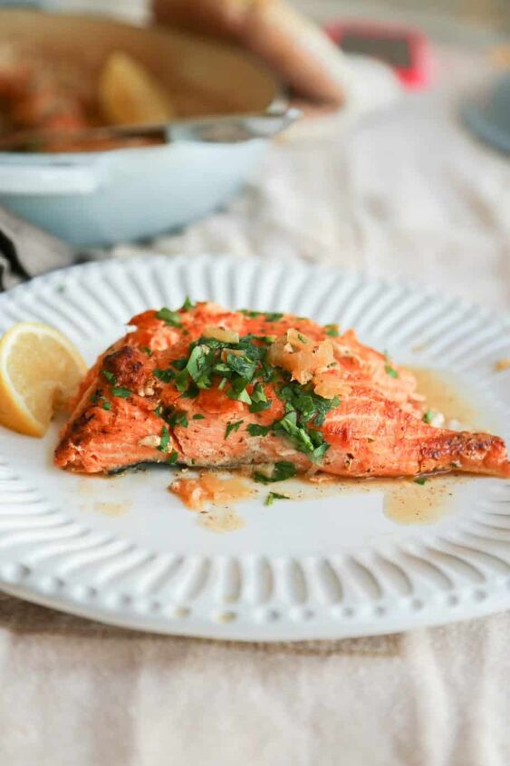 keto salmon recipe with butter sauce and shallots, keto salmon recipe on a plate with lemon