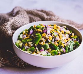 easy grilled corn salad, a large white ceramic bowl filled a rainbow corn salad