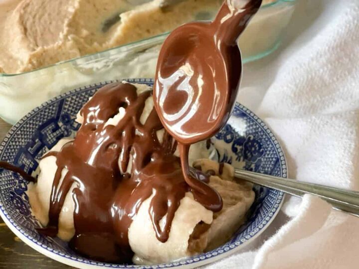 skinny chocolate dipping sauce, large spoon drizzling chocolate sauce over ice cream