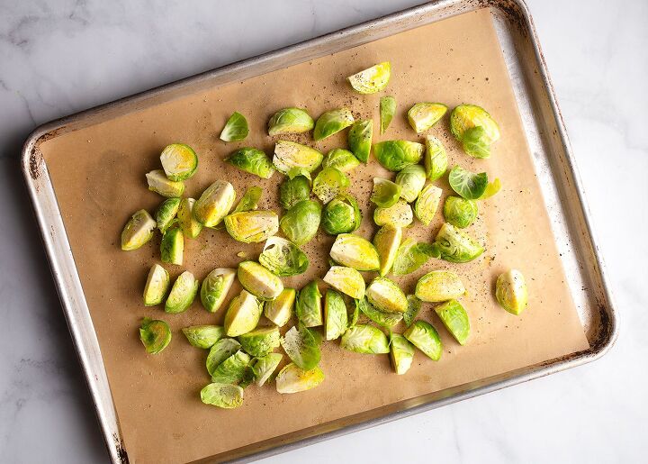 brussels sprouts with pancetta pecans, Cut Brussels sprouts with oil salt pepper on baking sheet