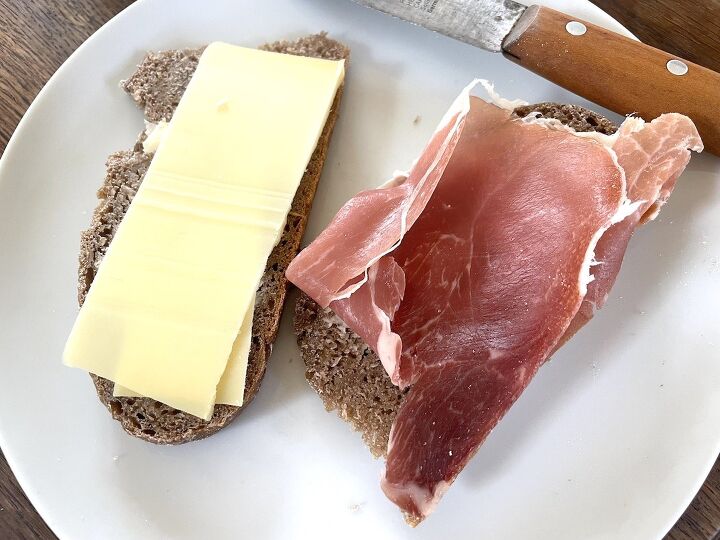 easy sourdough rye bread, sourdough rye bread slices with cheese and ham on plate