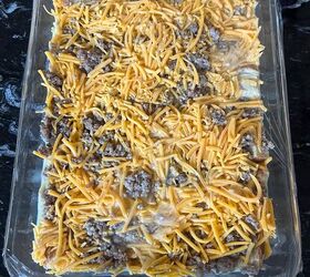 easy cheesy sausage and egg breakfast casserole make ahead in minutes, Unbaked casserole covered with plastic wrap