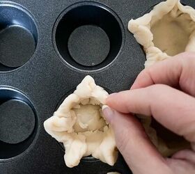 easy goat cheese tartlet cups bite size appetizers, Forming pie crust into star shapes in a mini muffin pan