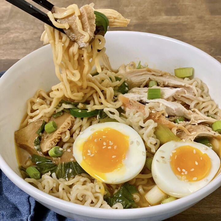 easy weeknight chicken ramen, Eating easy weeknight chicken ramen out of a white bowl with chopsticks
