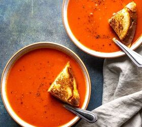 spicy tomato soup, spicy tomato soup in two bowls with grilled cheese on top