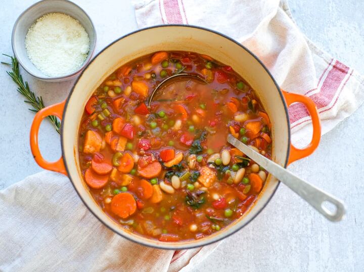 easy minestrone soup, easy minestrone soup recipe in a dutch oven pot with ladle