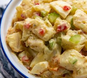 amish potato salad gluten free, a close up of the top of potato salad in a white serving bowl