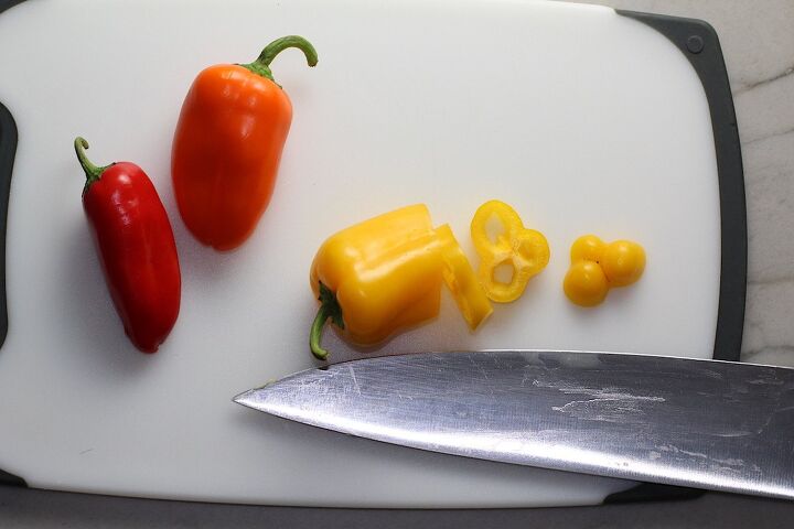 mouthwatering potato and steak bites recipe, Knife slicing mini sweet peppers for Garlic Potato and Steak Bites Recipe It s an easy and delicious one pan family dinner You get fantastic salty buttery tender steak and potatoes in each and every mouthwatering bite