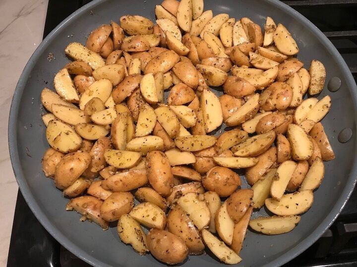 mouthwatering potato and steak bites recipe, Potatoes cooking in a pan for Garlic Potato and Steak Bites Recipe It s an easy and delicious one pan family dinner You get fantastic salty buttery tender steak and potatoes in each and every mouthwatering bite