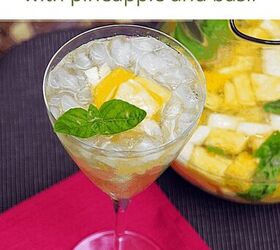 white wine sangria recipe with fresh herbs, White Sangria with pineapple and basil in a pitcher and long stemmed glass