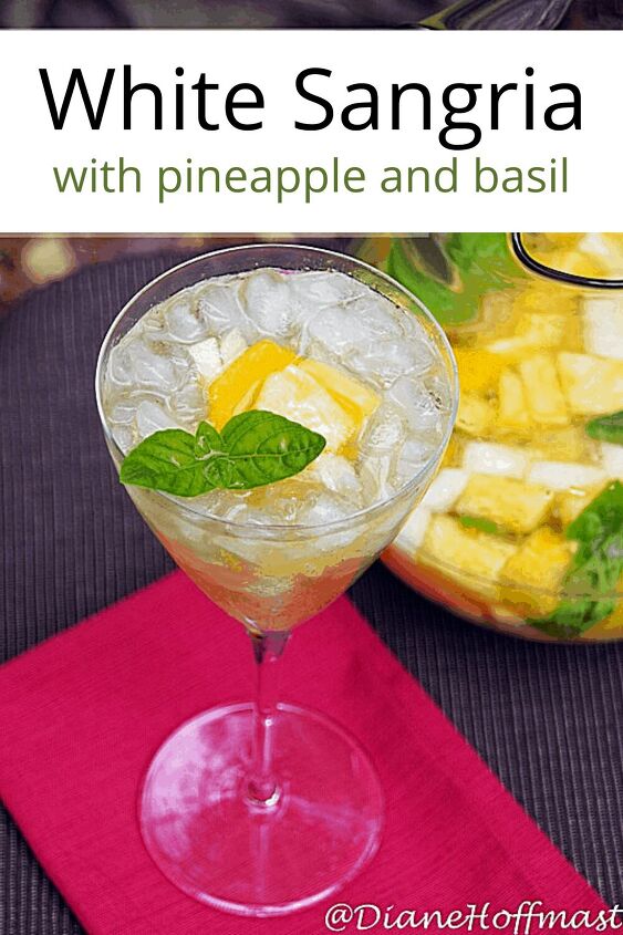 white wine sangria recipe with fresh herbs, White Sangria with pineapple and basil in a pitcher and long stemmed glass