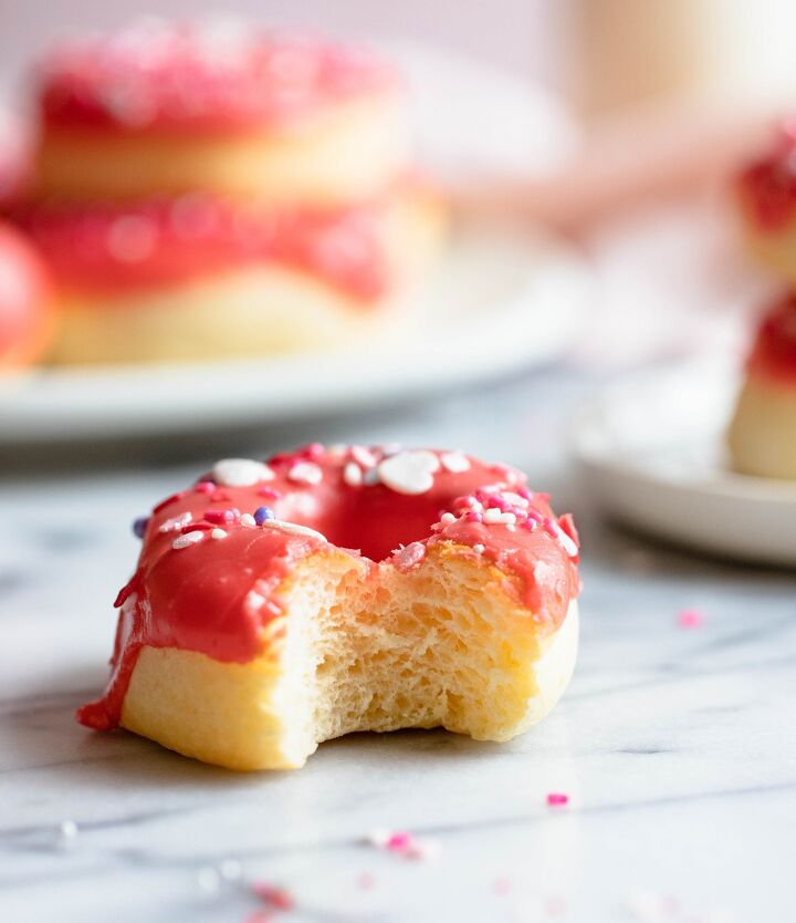 valentine donuts in air fryer basic recipe, close up of bitten into glazed donut