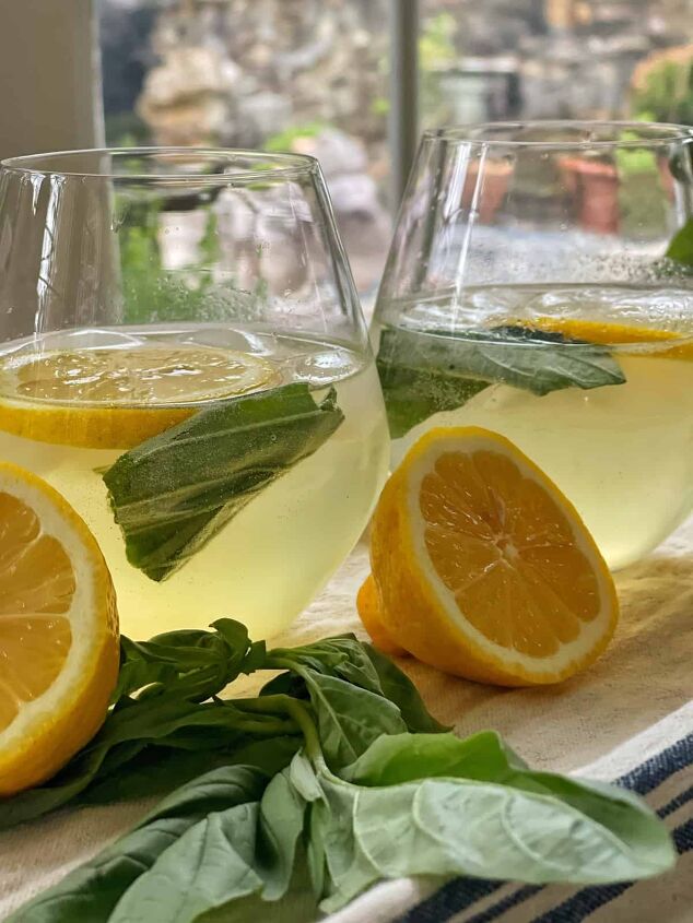 3 white wine spritzer recipes you should try, Lemon Basil white wine spritzer with fresh cut lemons and basil