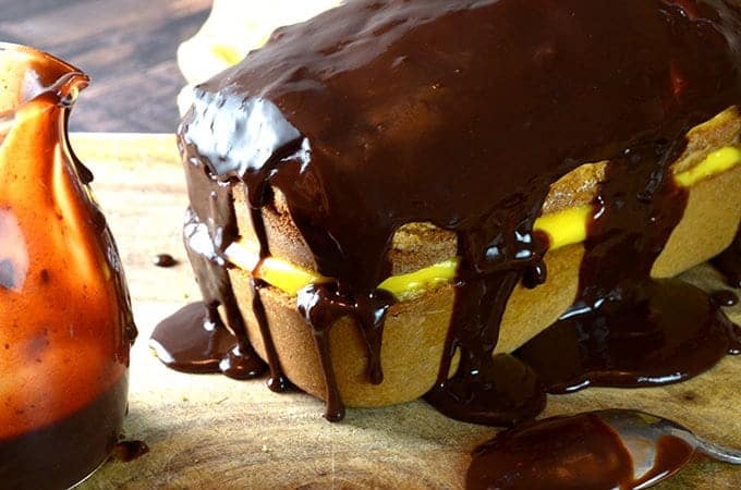 boston cream cake recipe, A cake drizzled with chocolate frosting