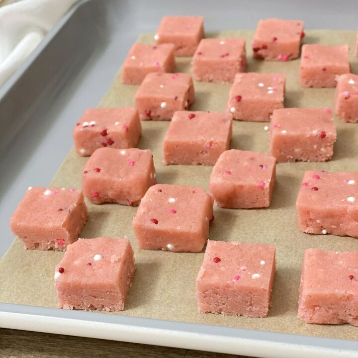 sweet valentine s shortbread bites, Sweet Valentine shortbread bites cutout in small cubes on a cookie sheet ready to bake in the oven