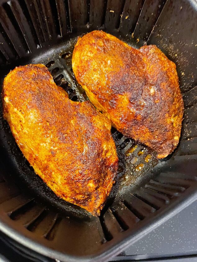 air fryer blackened chicken, Cooked chicken breast still in air fryer basket Let rest for 2 3 minutes before serving