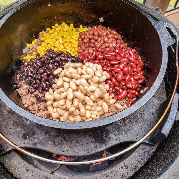 best dutch oven taco soup, Assorted beans and corn added to a Dutch oven on a Big Green Egg