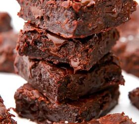 the best vegan brownies, A stack of 4 vegan brownies sprinkled with course salt