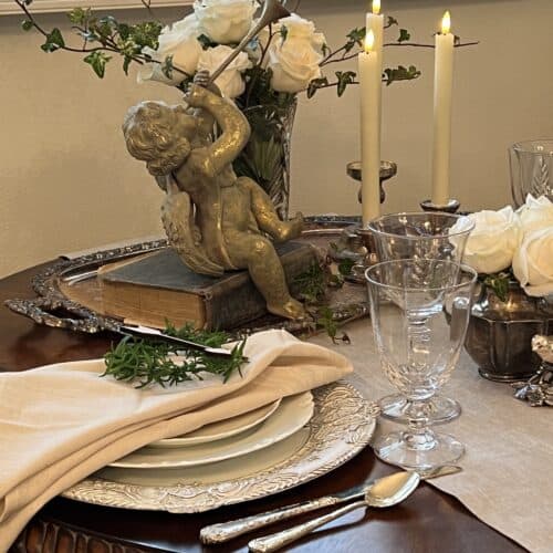 how to make delicious crab stuffed salmon, rope edge table linen table runner white roses white candles black vintage book rose and ivy silver tray white plates scalloped plates