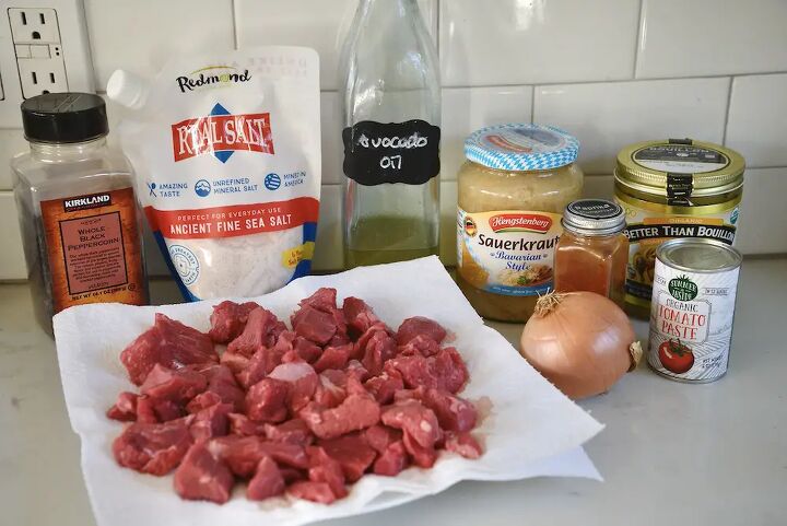 easy hungarian beef goulash recipe, ingredients for Hungarian beeg goulash on kitchen counter