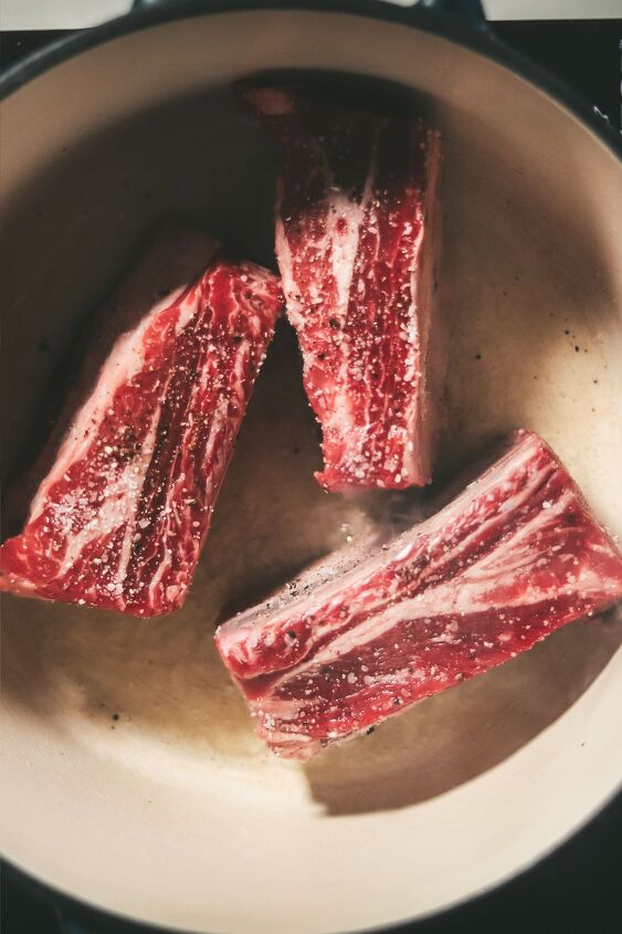 braised beef short ribs, Short ribs in a Dutch oven just starting to cook