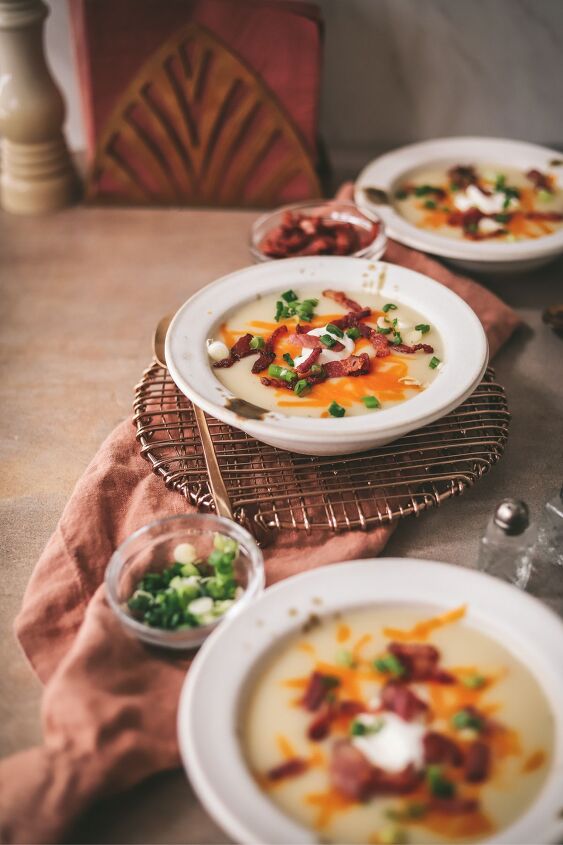 easy potato soup recipe, The bowls of potato soup with bacon green onions and cheddar