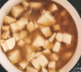 easy potato soup recipe, Add your potatoes and stock and simmer for 25 minutes