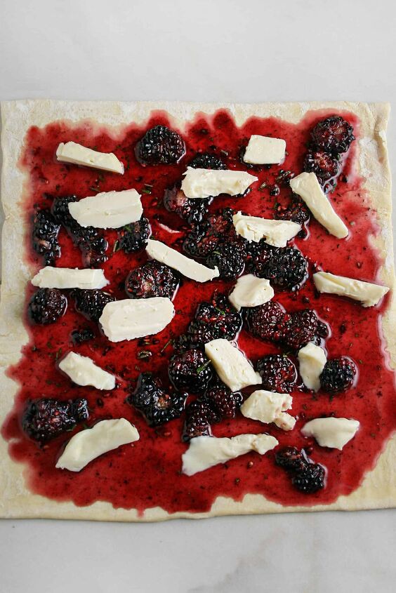 blackberry brie pinwheel, Blackberry honey and brie spread out on puff pastry dough