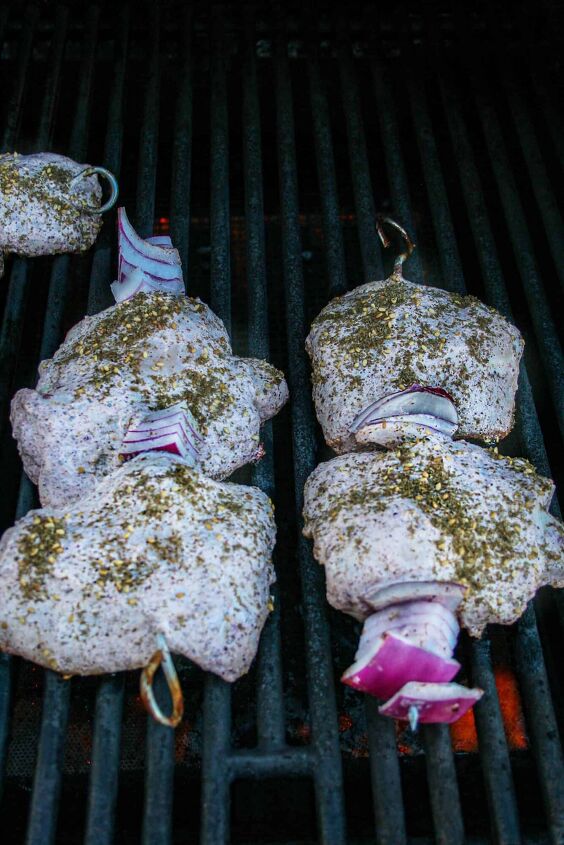 za atar grilled chicken thighs, Process shot of grilling for za atar grilled chicken thighs threaded on the skewer ready to be grilled