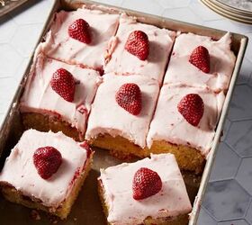 strawberry jam cake with cream cheese frosting, Strawberry Cake cut into slices with strawberries on each slice