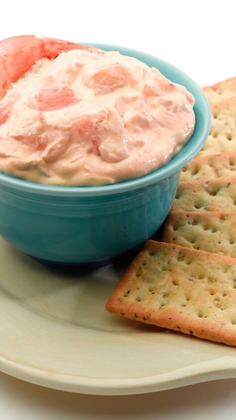 quick easy shrimp dip, small bowl of shrimp dip on a plate with crackers