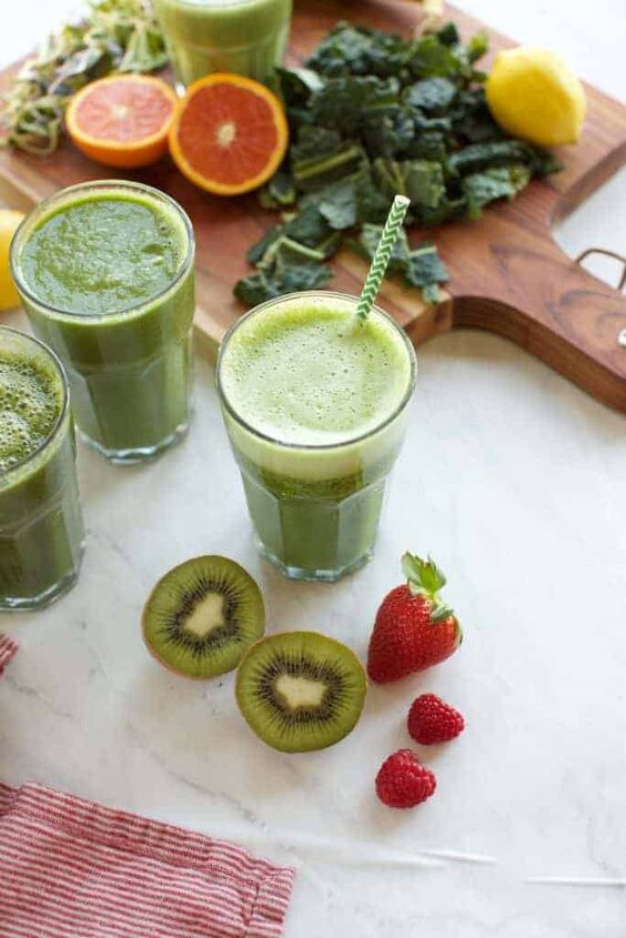 green smoothie recipes for beginners, 3 green smoothies in glasses with fruit on the side